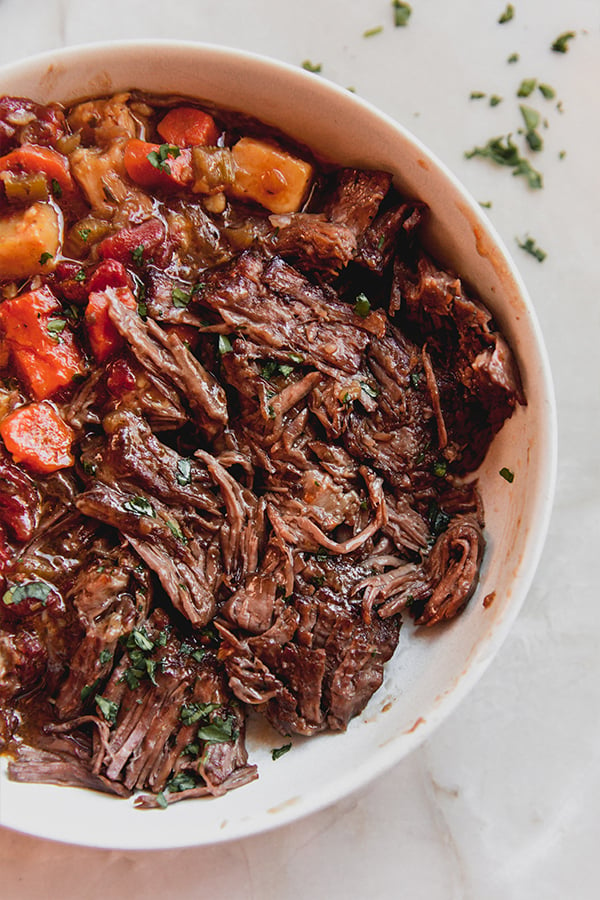 A bowl of Italian pot roast after cooking.