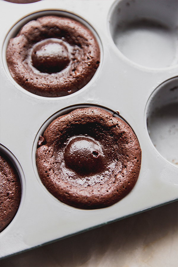 A pan of chocolate lava cakes after baking.