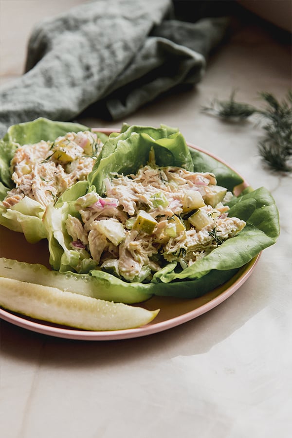 Easy dill pickle chicken in lettuce wraps ready to be enjoyed.