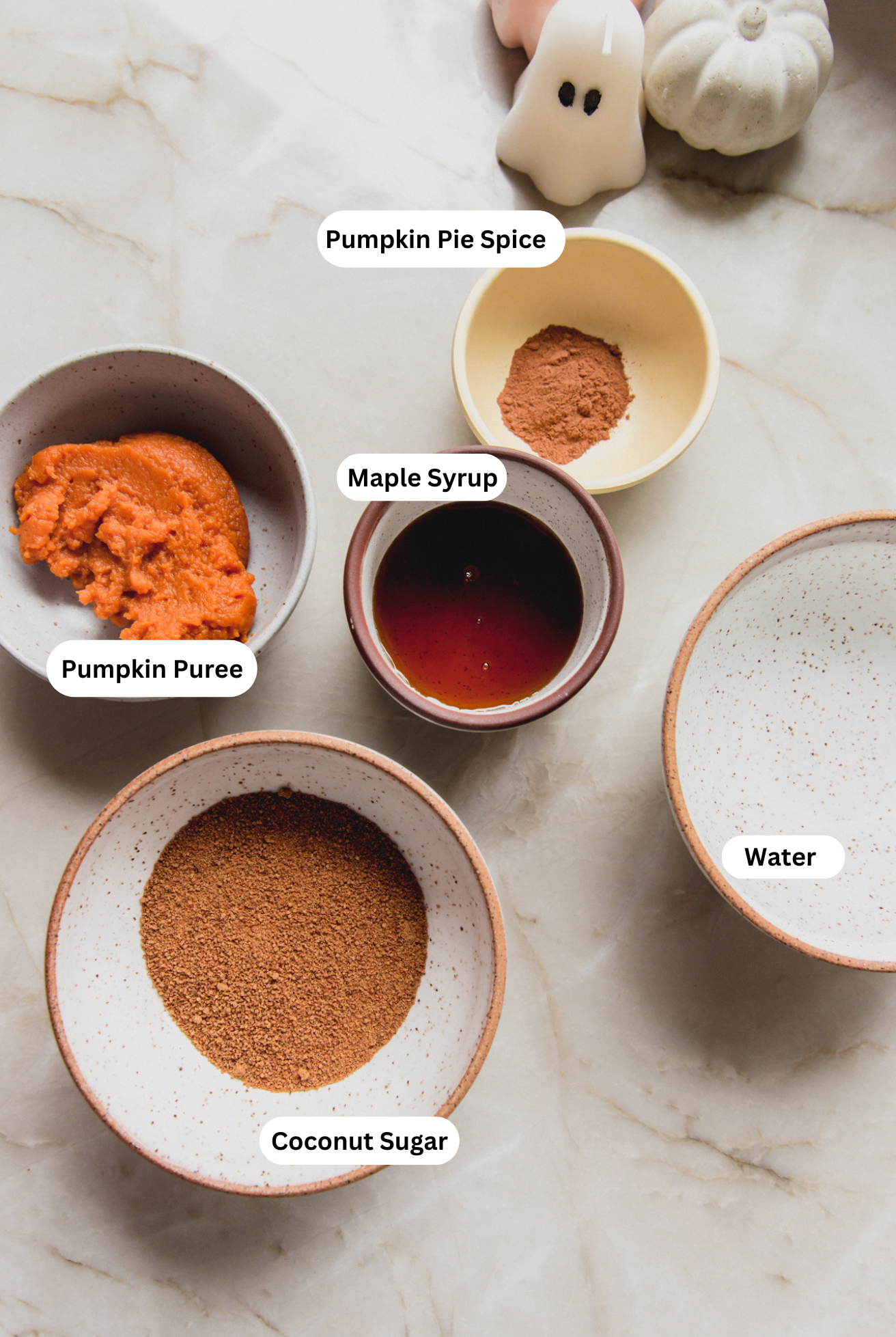 Pumpkin syrup ingredients in bowls. 