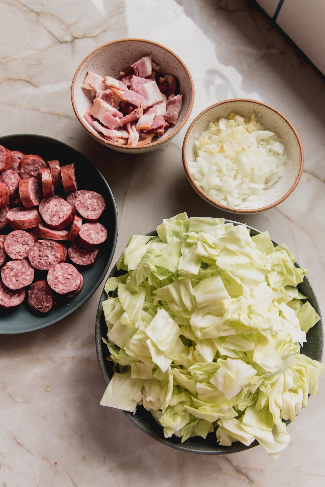 Southern cabbage ingredients in bowls.