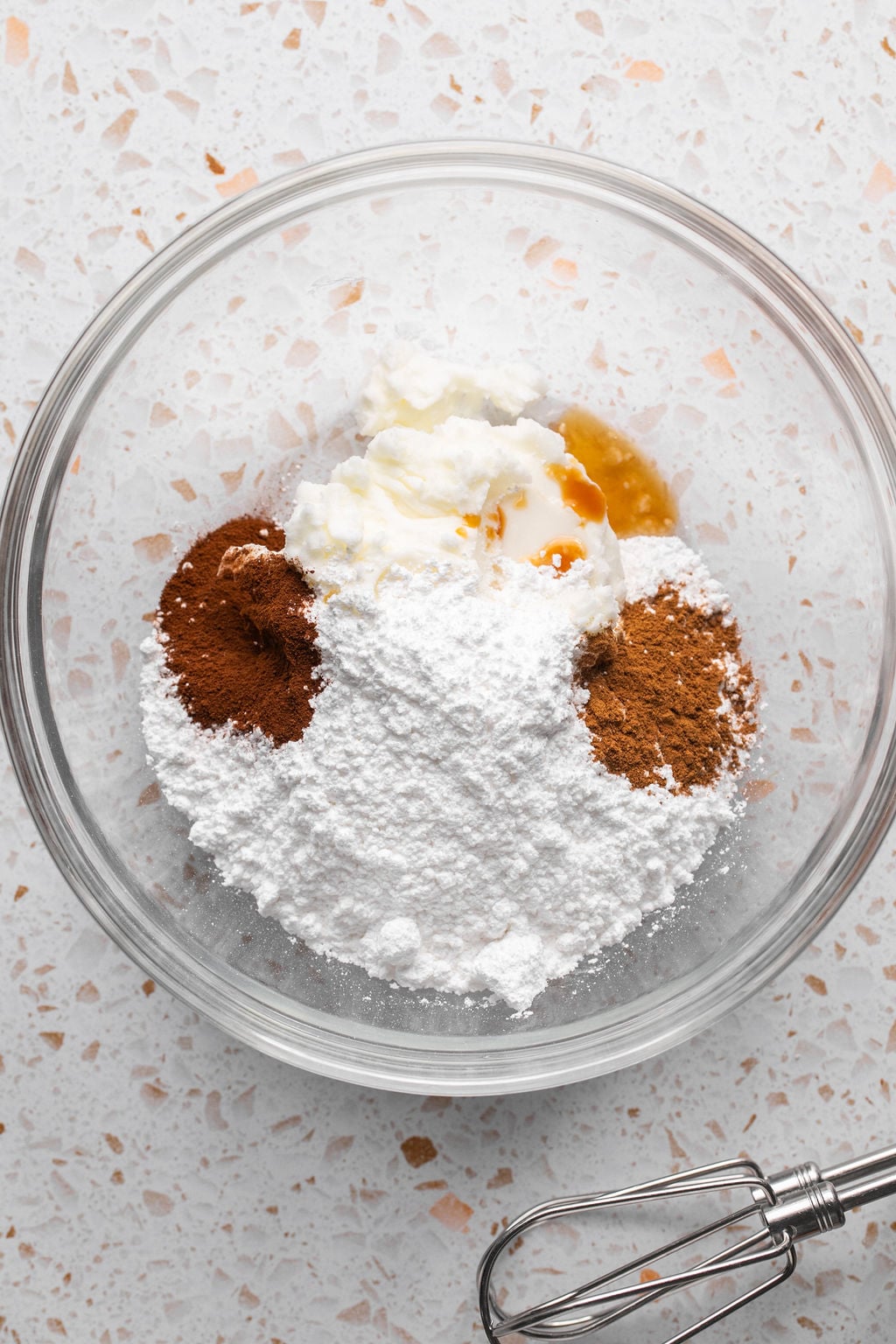 Pumpkin spice icing ingredients, unwhisked.