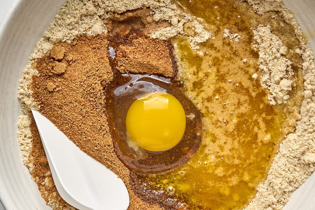 Cookie bar ingredients in a bowl, unmixed. 