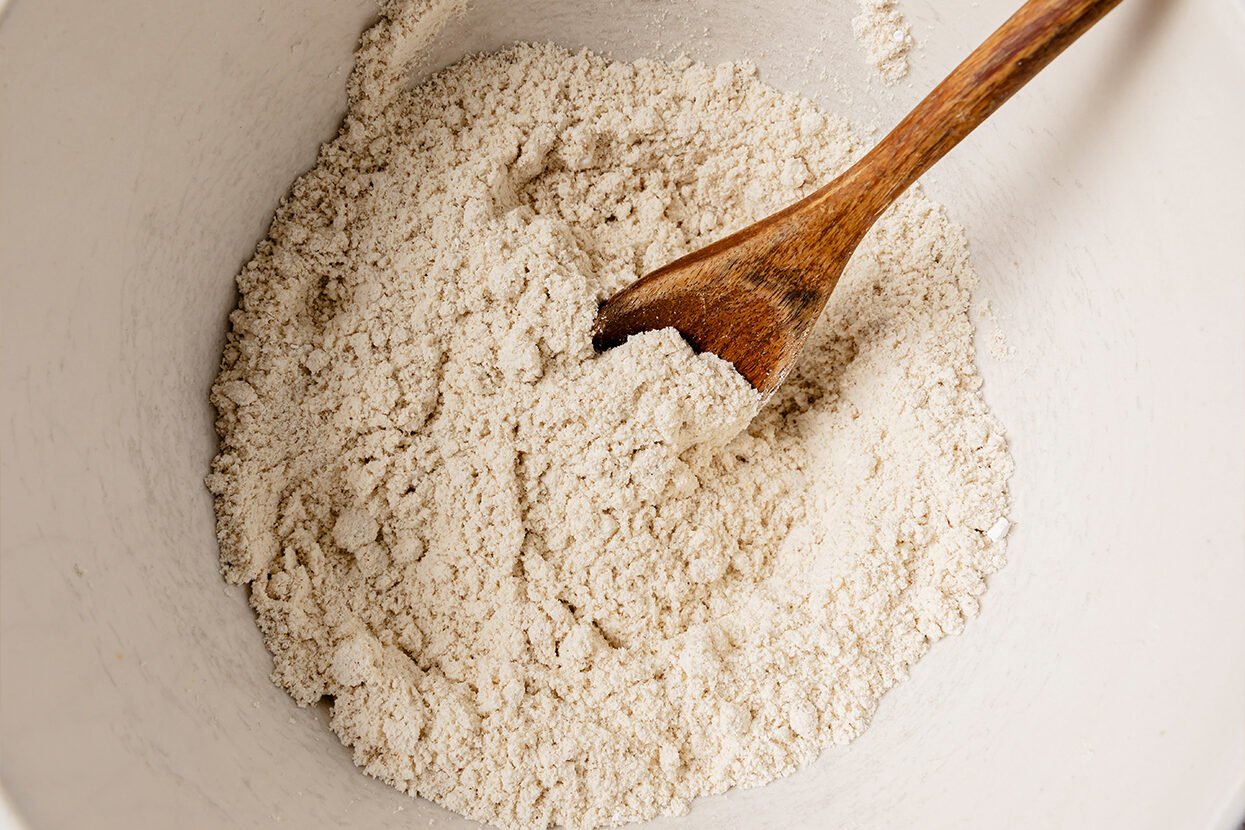 the dry ingredients for making snickerdoodle cookies in a bowl.