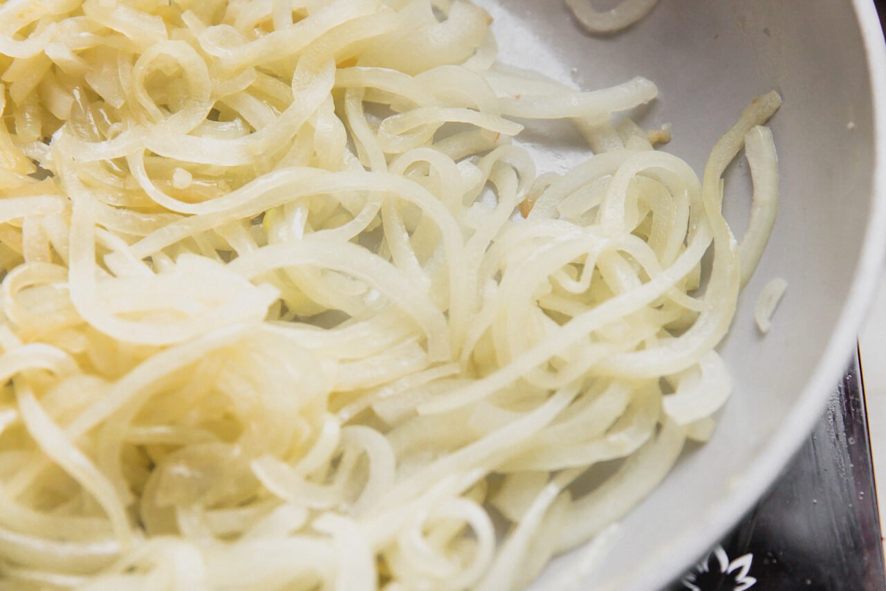 Slice onions caramelizing. 