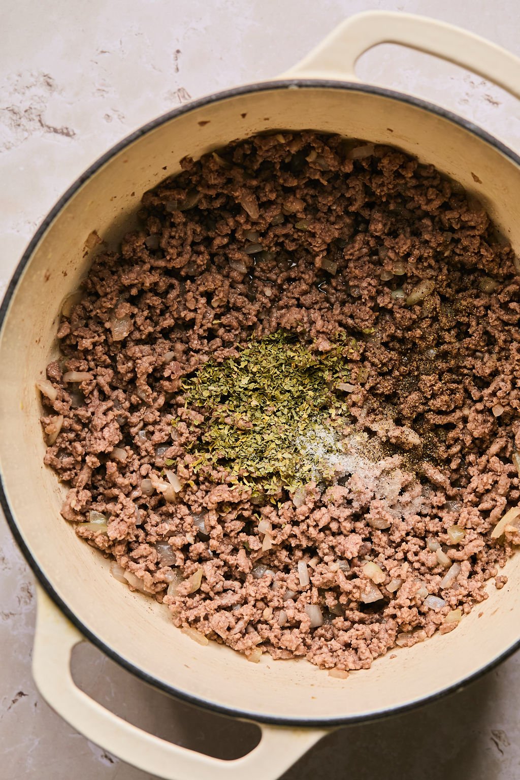 ground beef, onions, and spices sauted on stovetop