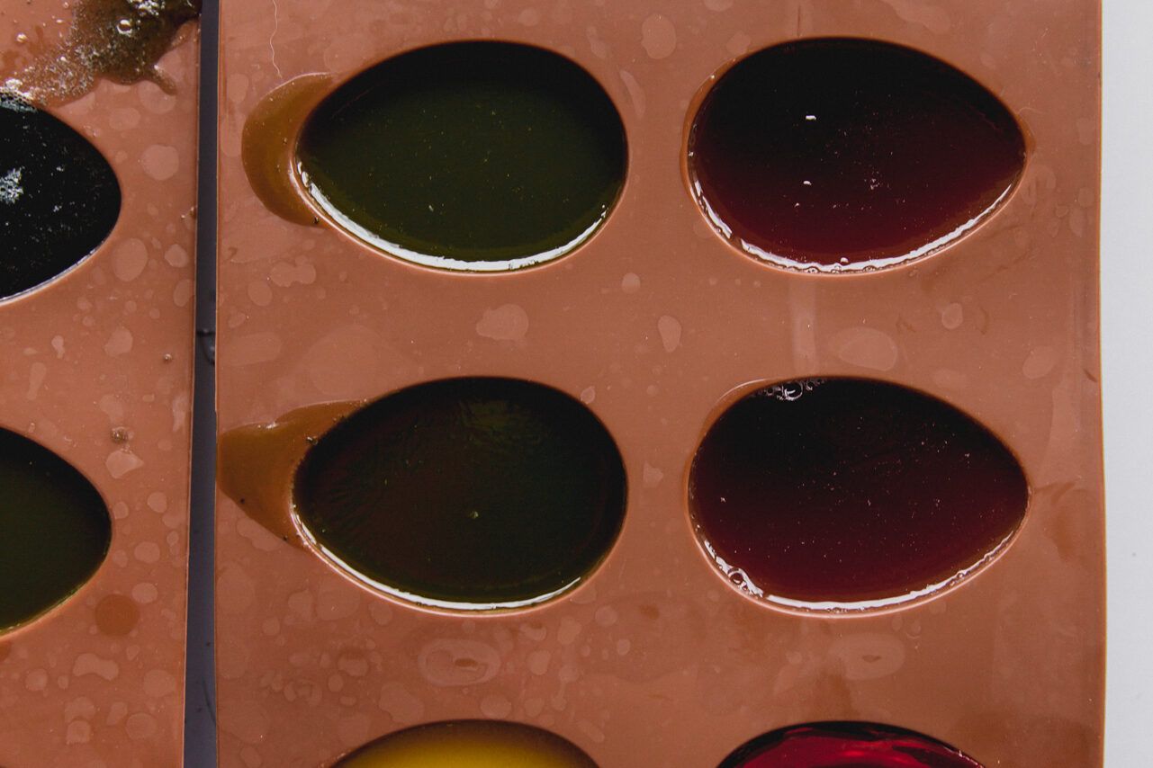 The egg molds filled with the gelatin mixture before setting.
