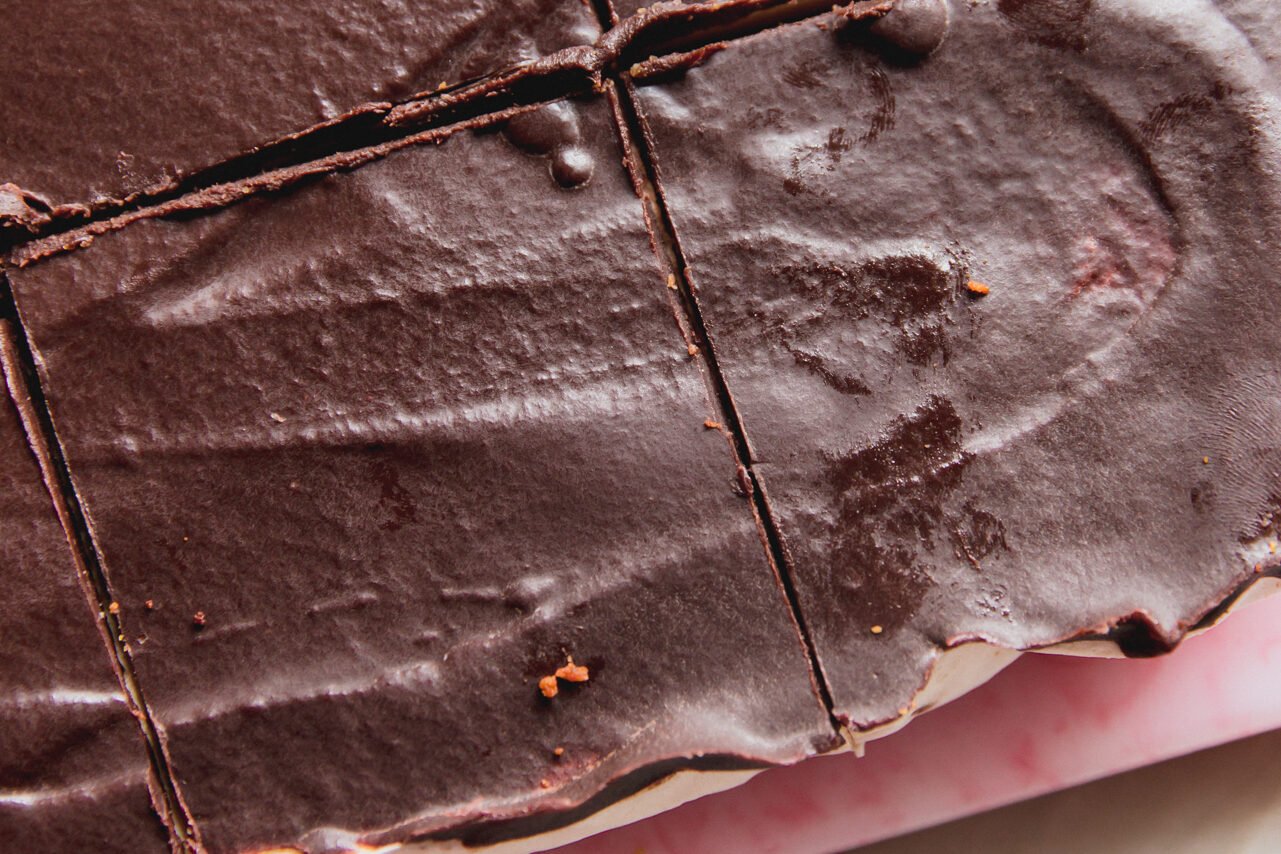 The s'mores protein bars cut into pieces.