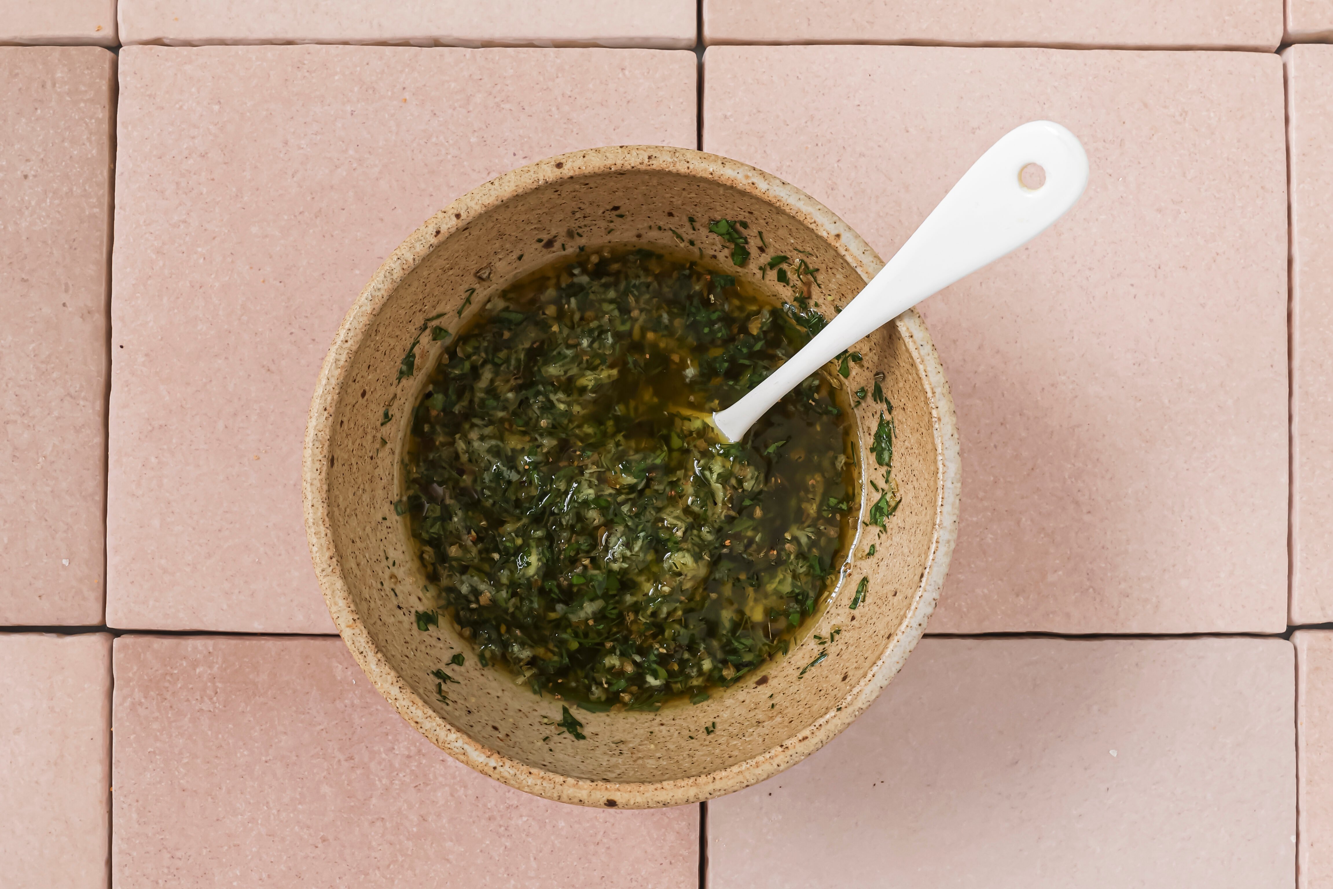 Chicken souvlaki marinade in a bowl.