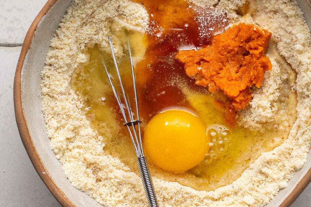 Corn dog muffin ingredients in a bowl.
