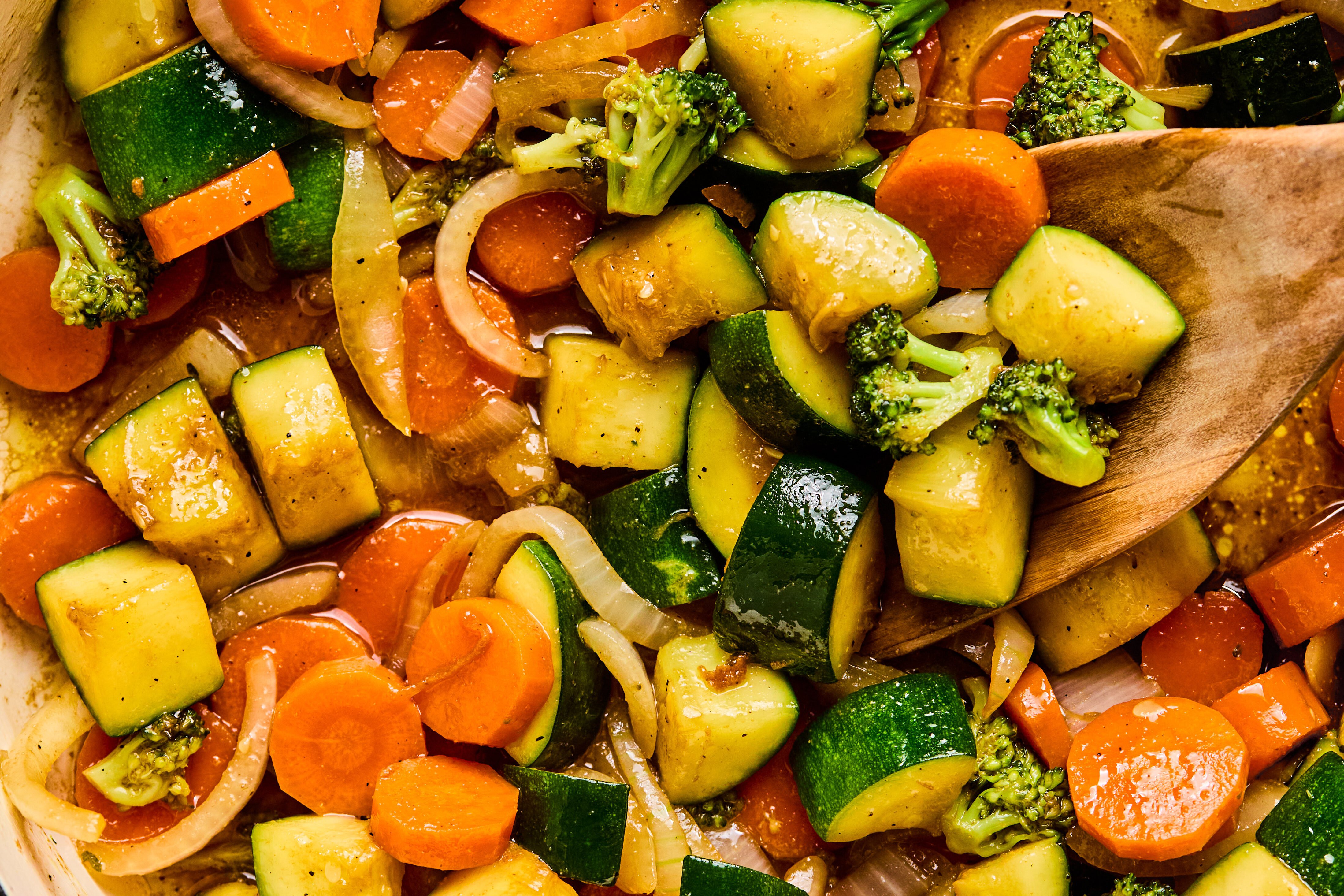 Hibachi chicken vegetables cooked in a pan.