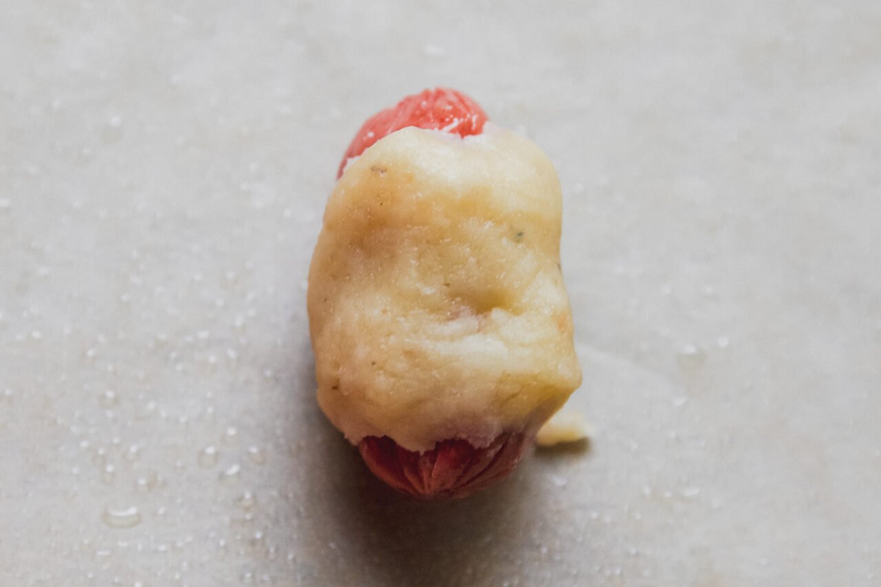 Pig in a blanket uncooked.