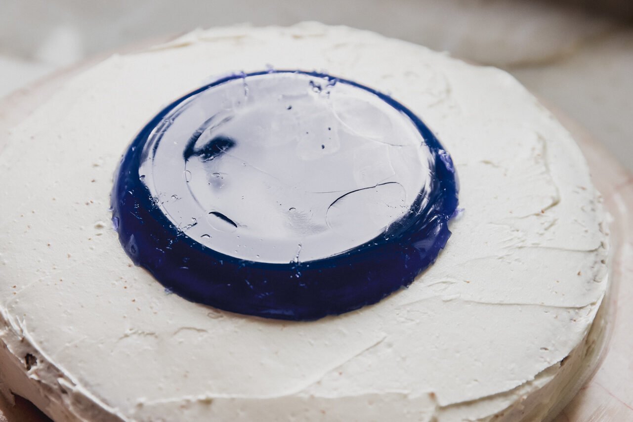 Jello pool on top of prepared cake.