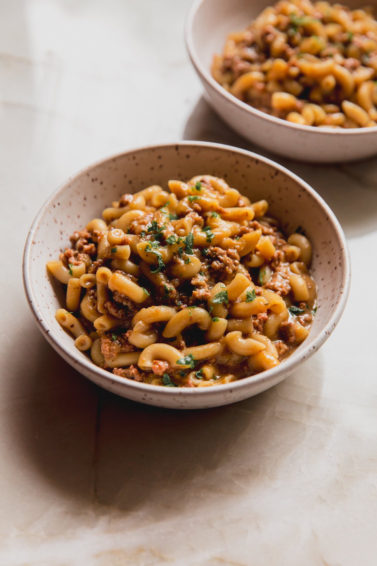 A bowl of slow cooker hamburger helper on the counter. 