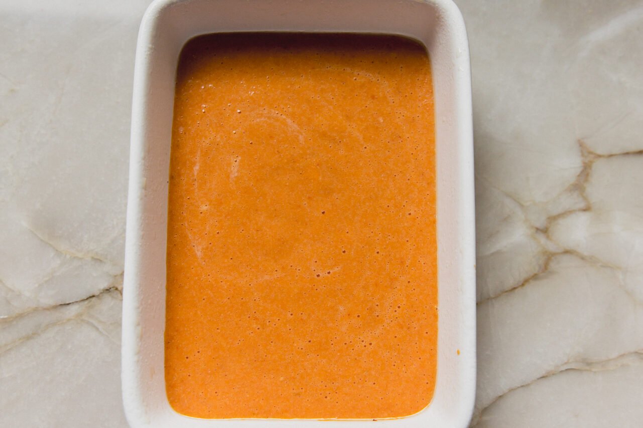 The liquid ingredients for the pumpkin protein breakfast cake before forming the dough.