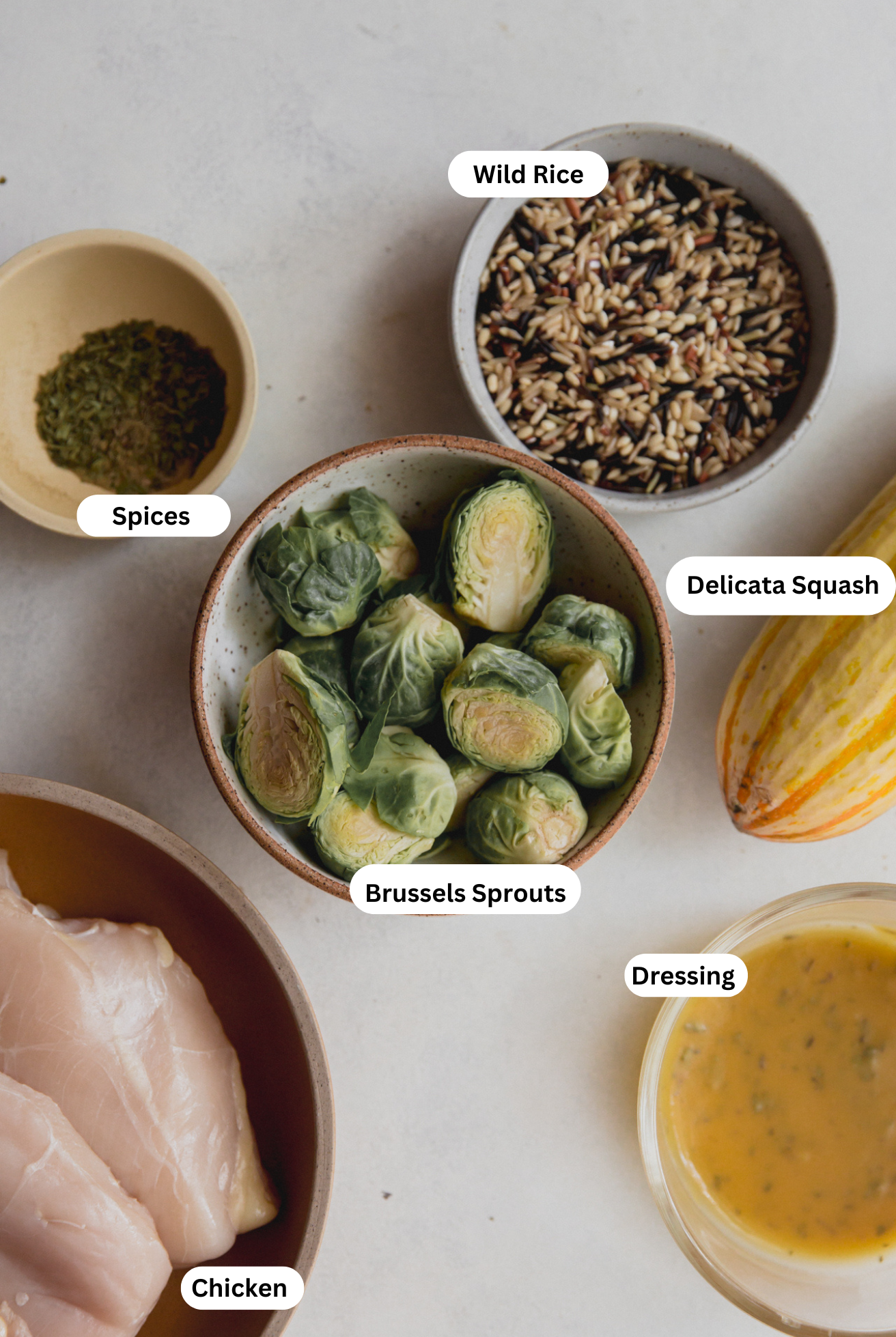 All the ingredients for roasted squash and chicken harvest bowls.
