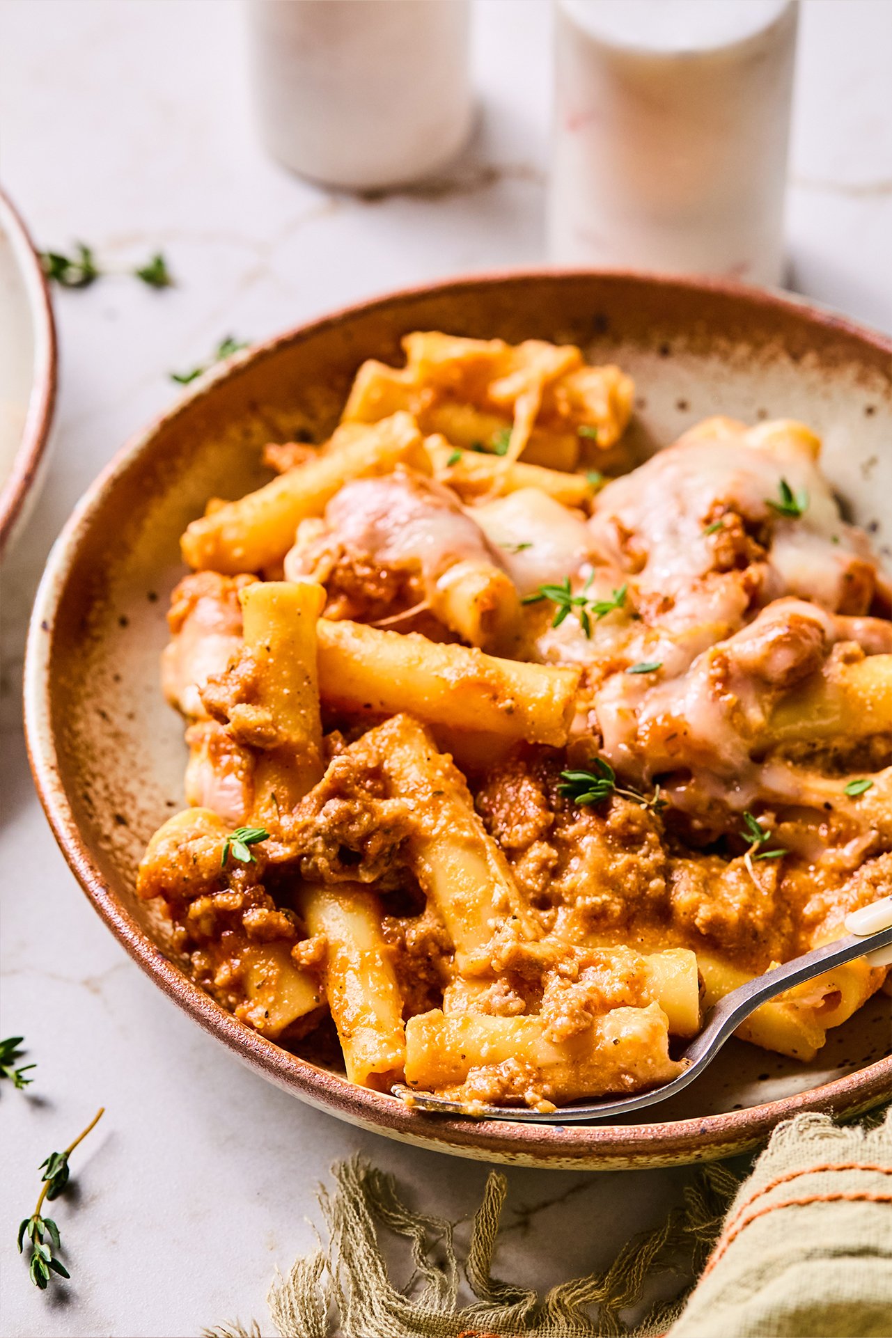 Butternut baked ziti on plate with fork.