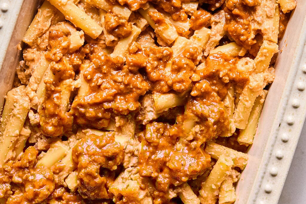 The pasta, cheese mixture, and sauce mixture. 