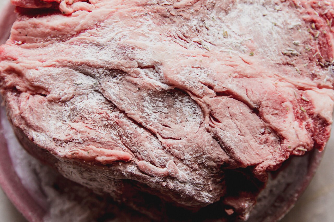 The chuck roast covered in arrowroot starch.