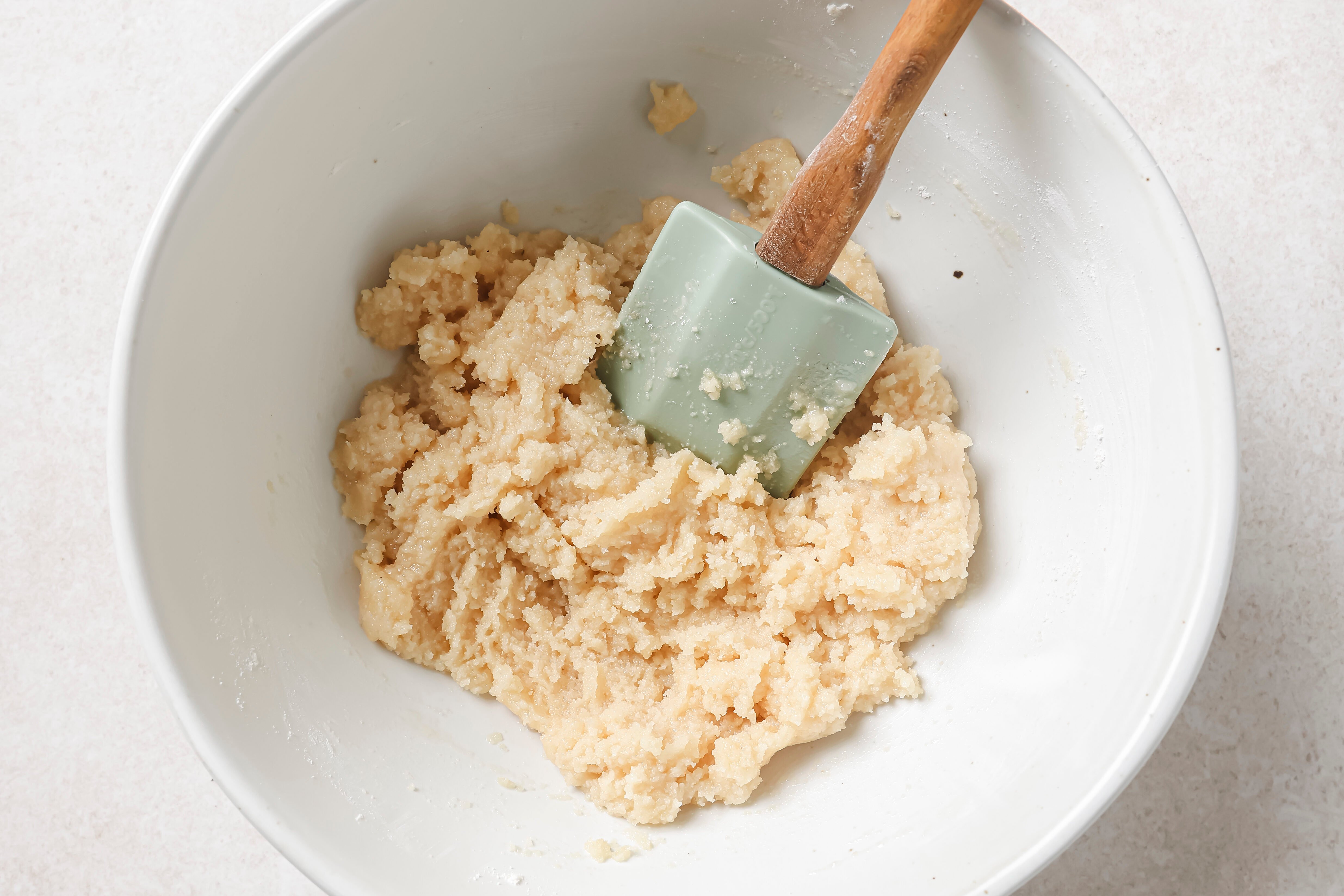 Pumpkin pie bar crust dough in a bowl.