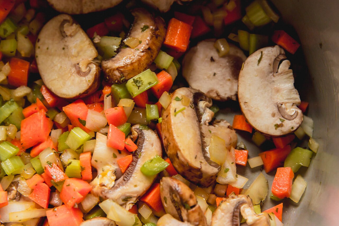 Sauting vegetables in a Dutch oven.