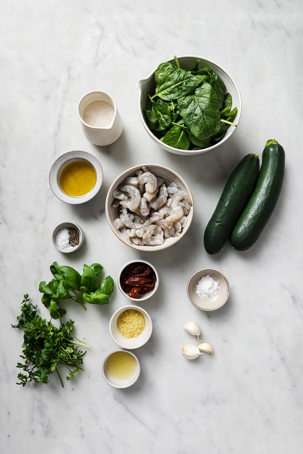 Tuscan garlic shrimp ingredients in separate bowls.