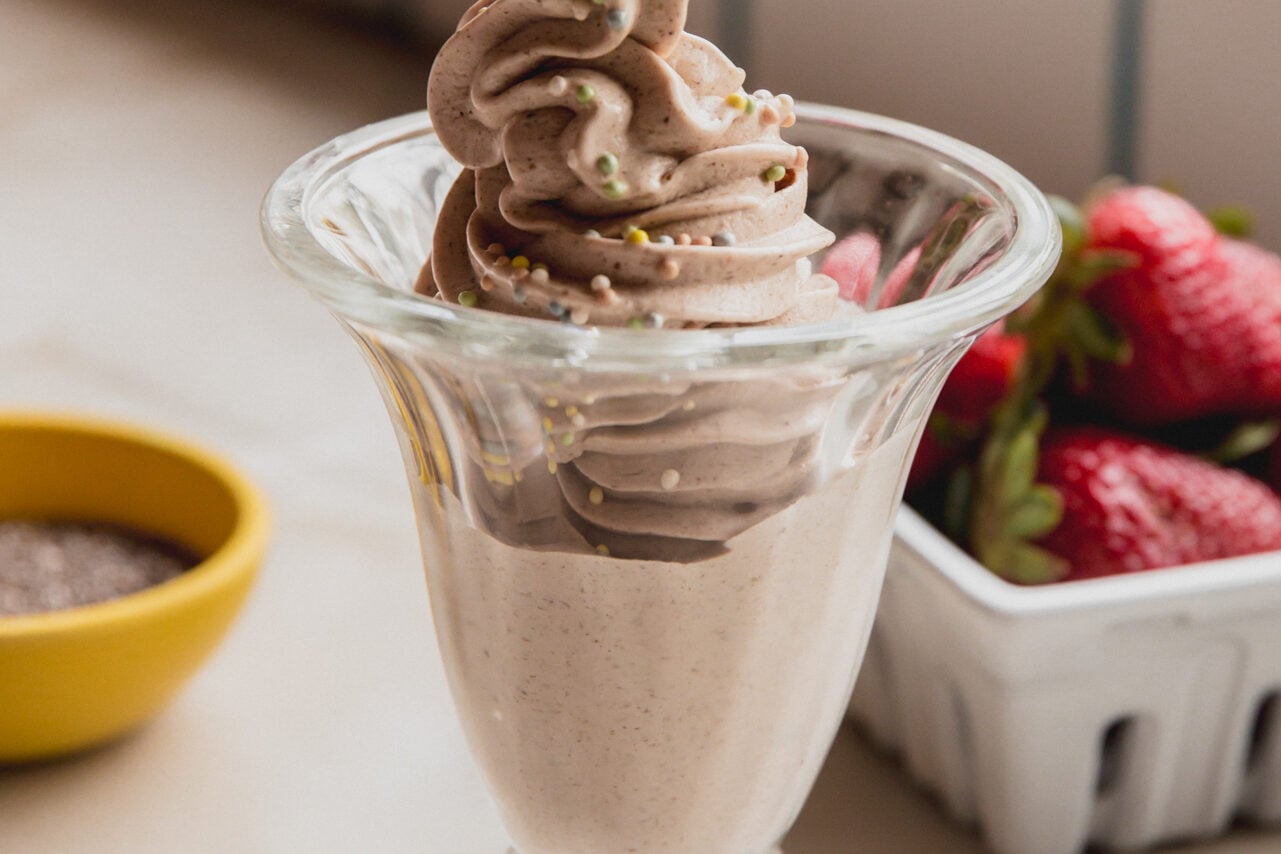 The chia seed ice cream in a glass bowl topped with sprinkles.