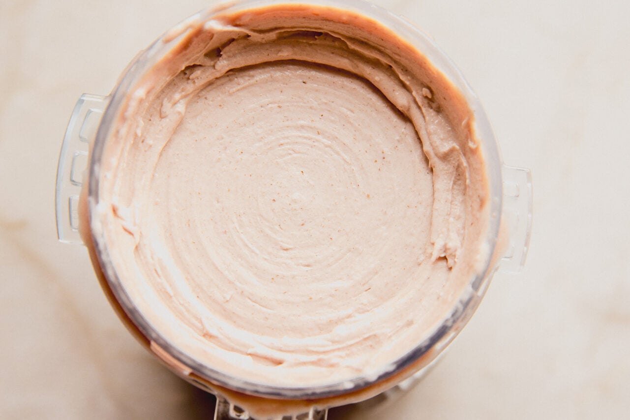 The pint container of the creami after being frozen before mixing.