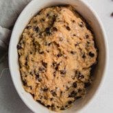 High protein cookie dough in a pink dish.