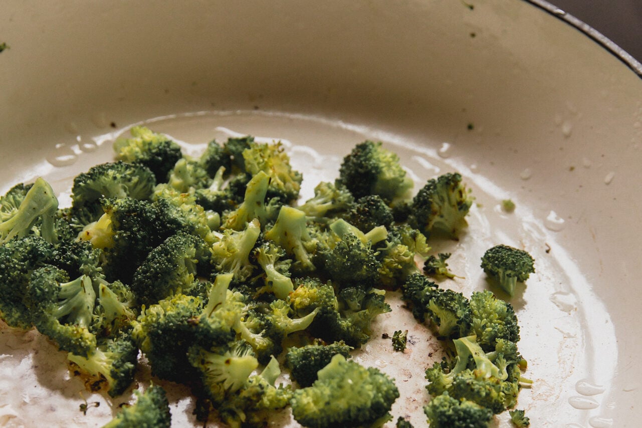 Cooked broccoli in a pan. 