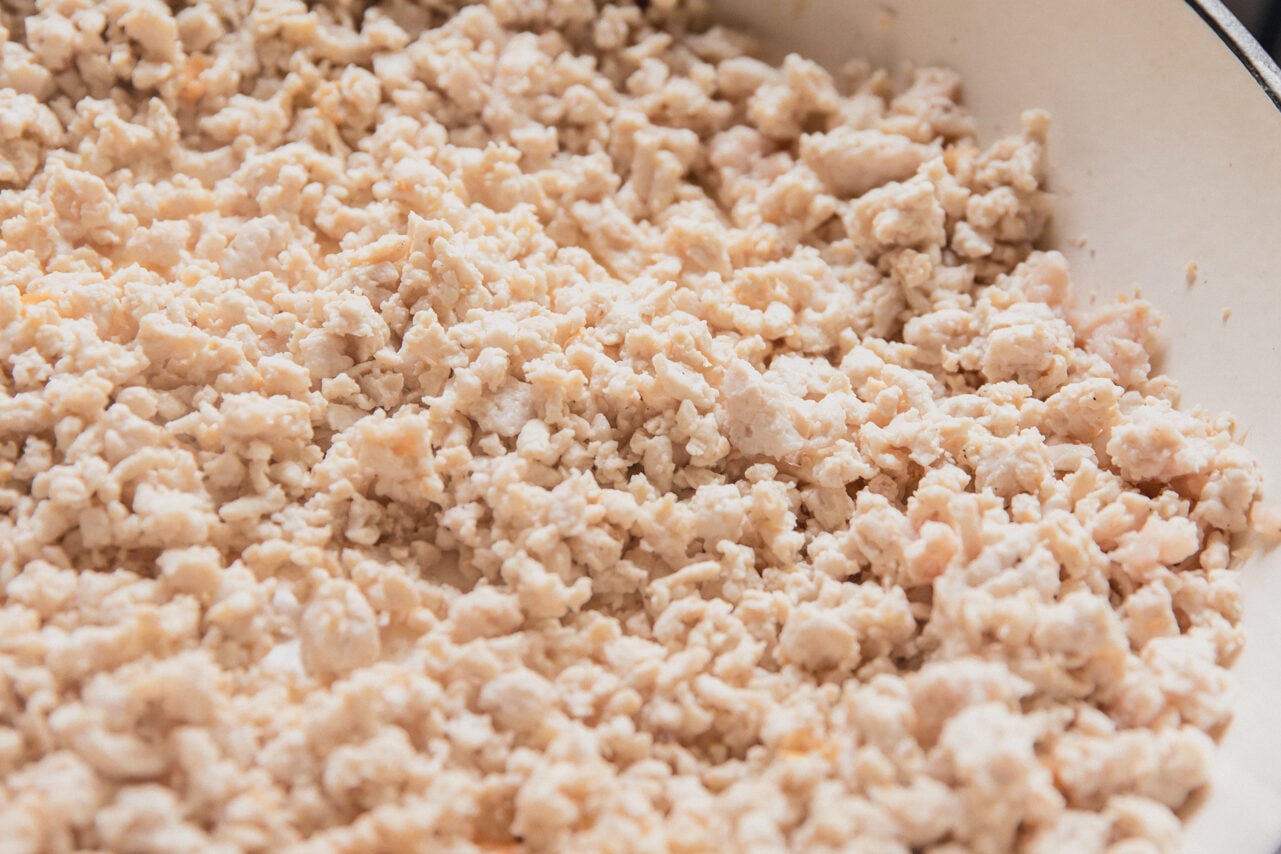 Cooked ground chicken in a pan.