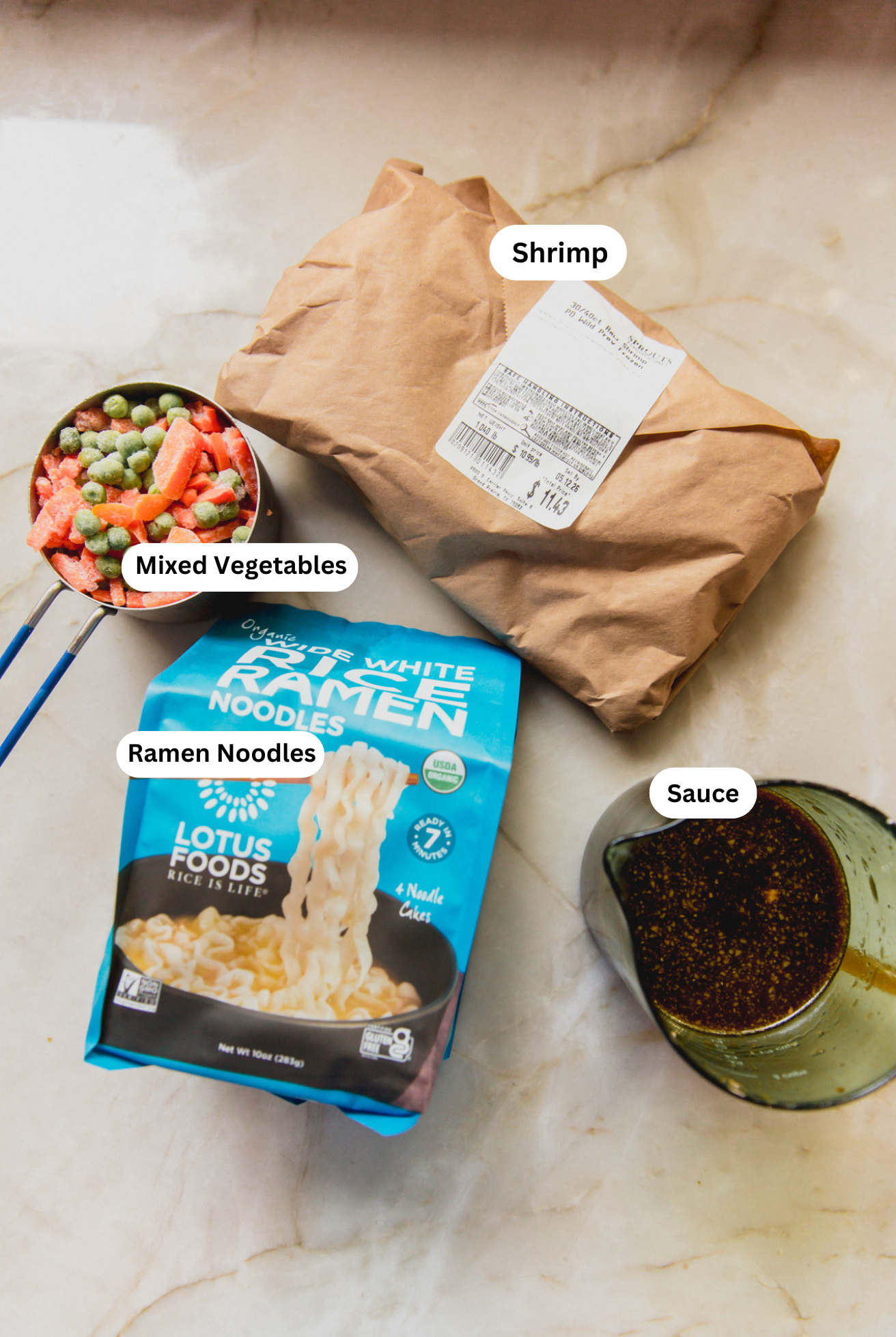 All the ingredients needed to make the shrimp ramen noodle bake before cooking begins.