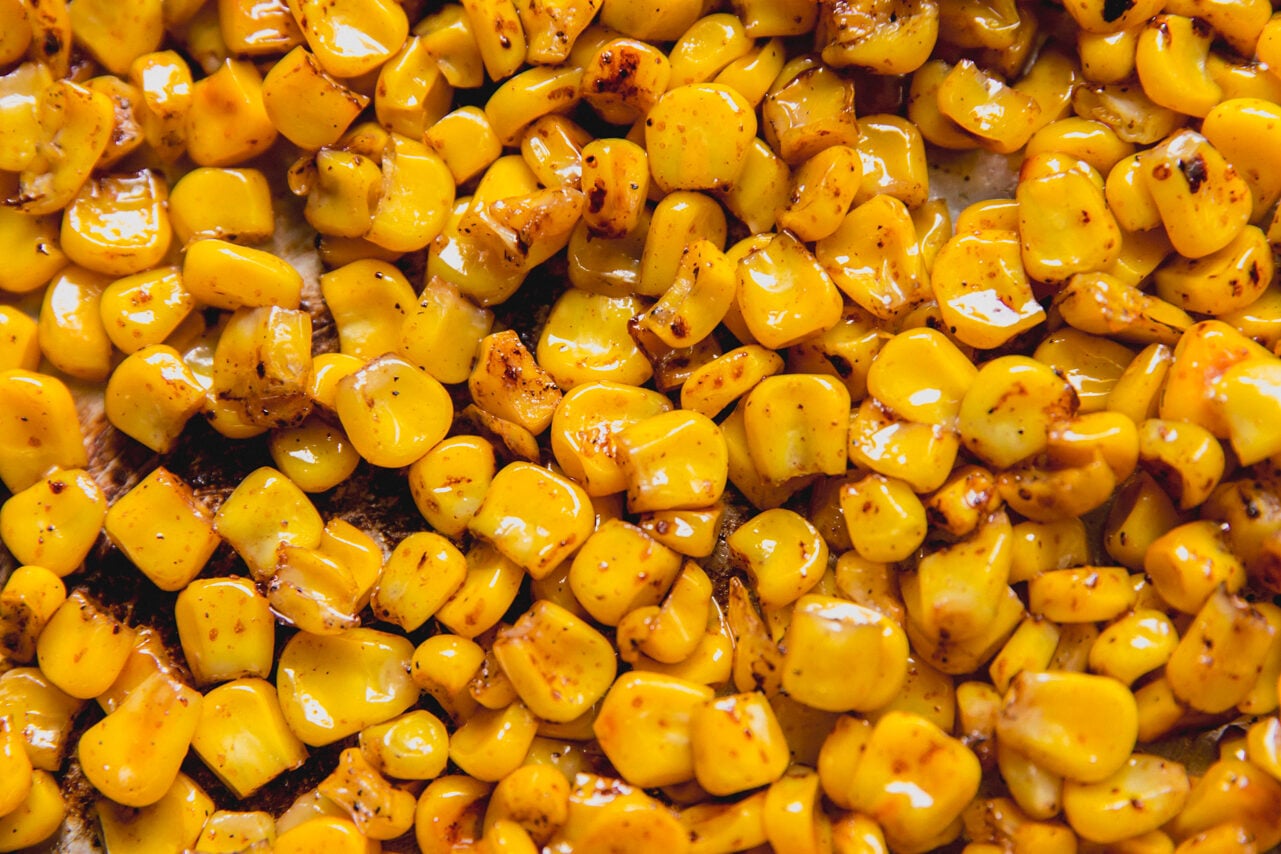 Corn sauting in a pan.
