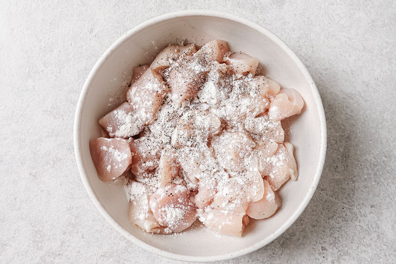 Cubed chicken breast tossed with salt, pepper and arrowroot starch.
