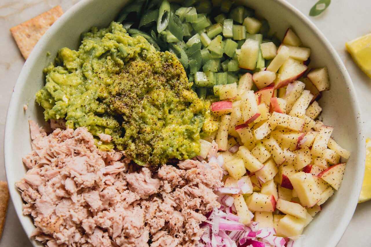 Avocado tuna salad ingredients unmixed in a bowl